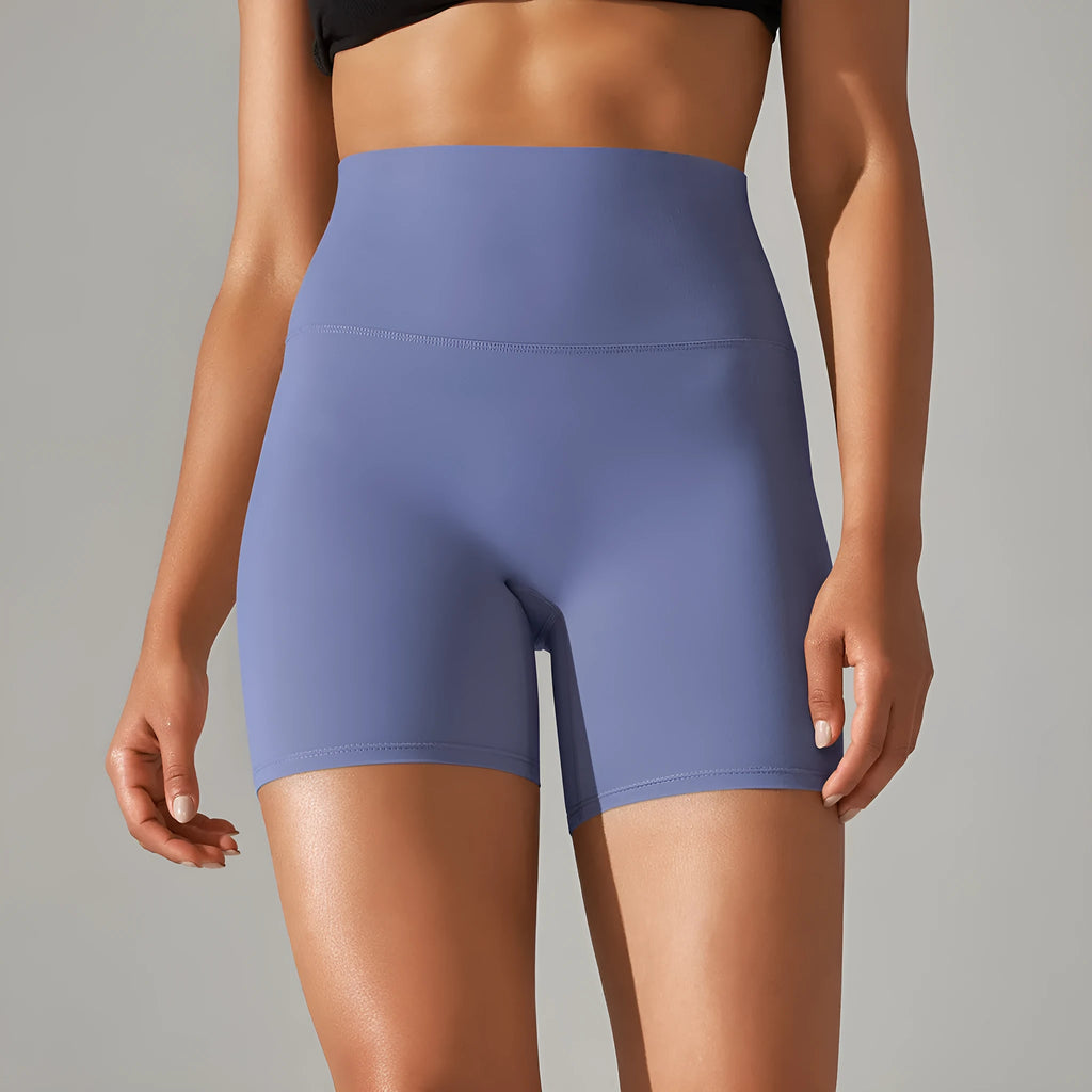 Women's high waist hip lift fitness pants in dark green with moisture-wicking fabric for sports activities