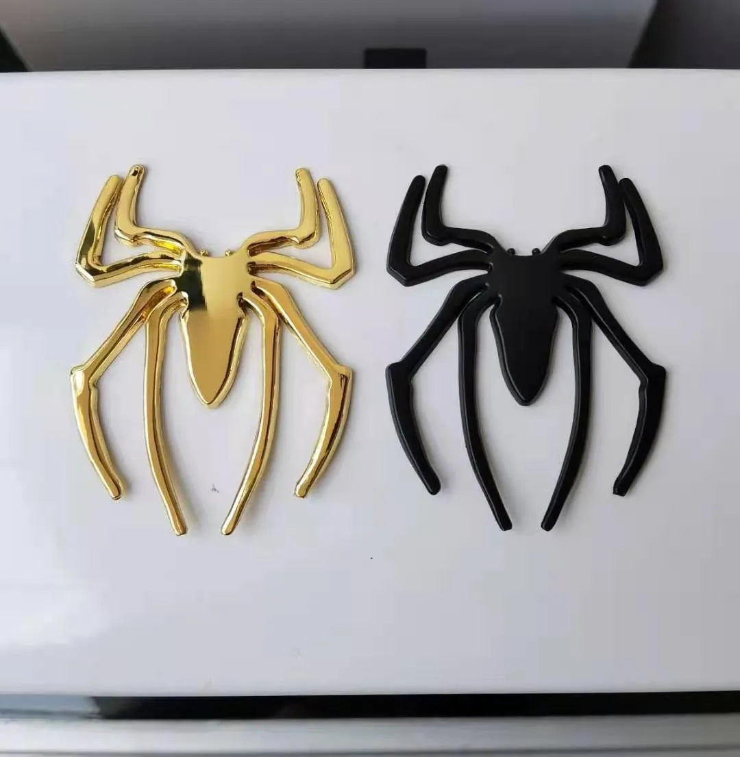 Zinc alloy 3D spider car bumper sticker in gold, silver, black, and red colours.