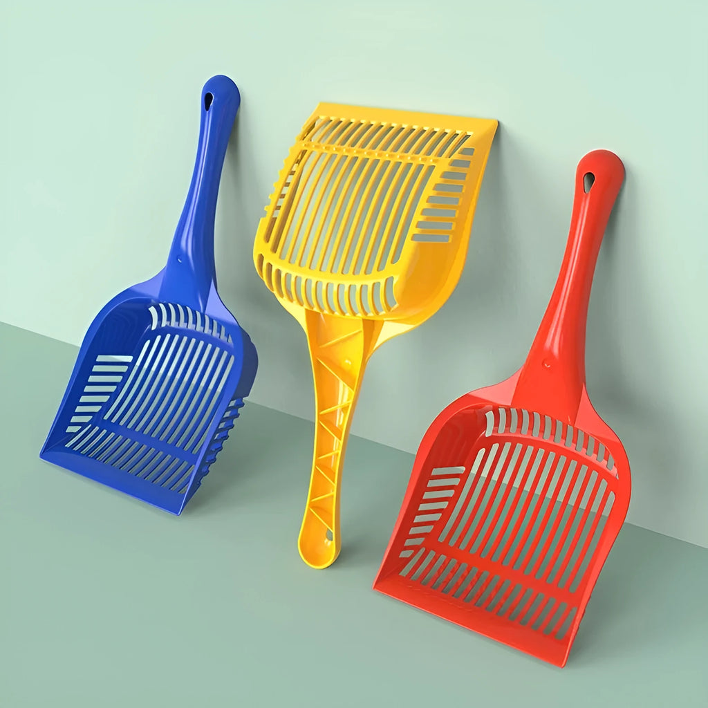 Red plastic cat litter scoop next to a yellow and blue one, showing two size options for litter tray cleaning.