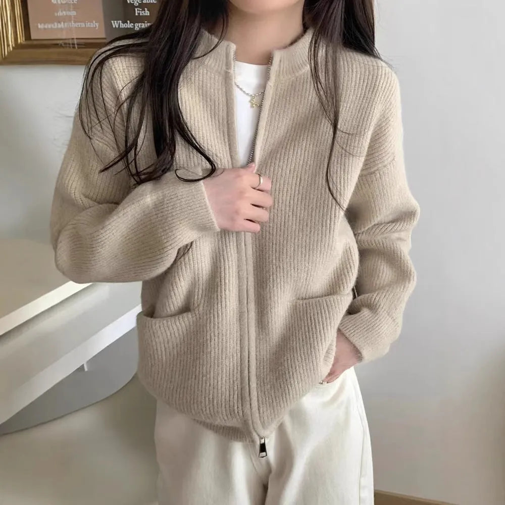 Beige viscose soft wind sweater coat, a long sleeve cardigan laid flat.