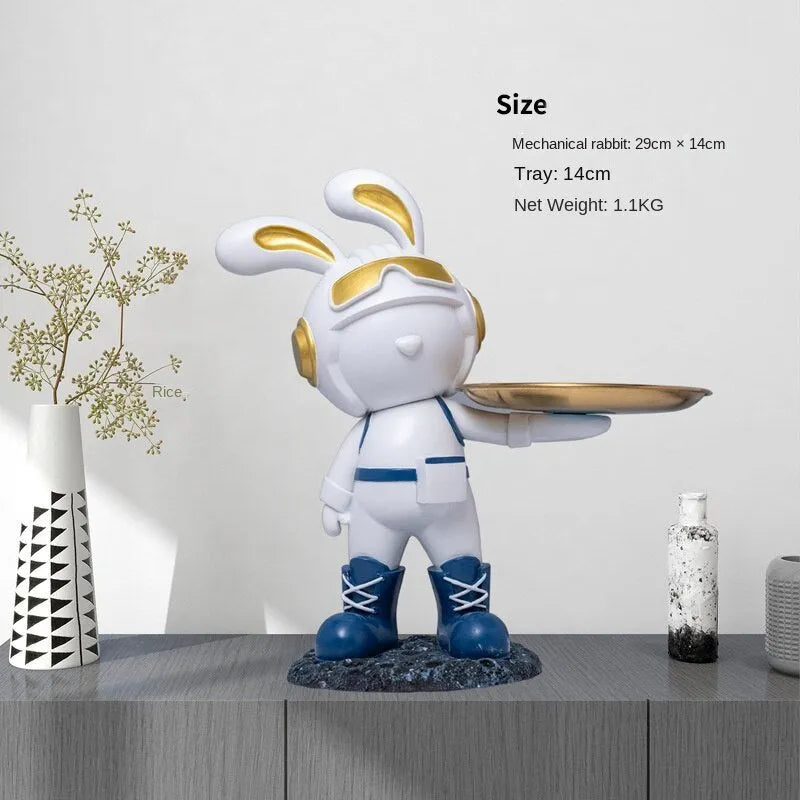 Decorative resin rabbit key storage box for home entry in white colour on a wooden table