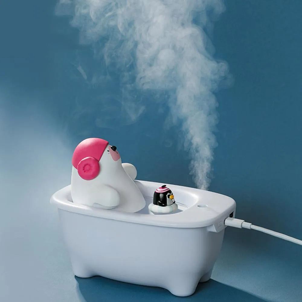 White USB desktop air humidifier with 550ml transparent water tank showing nano mist output
