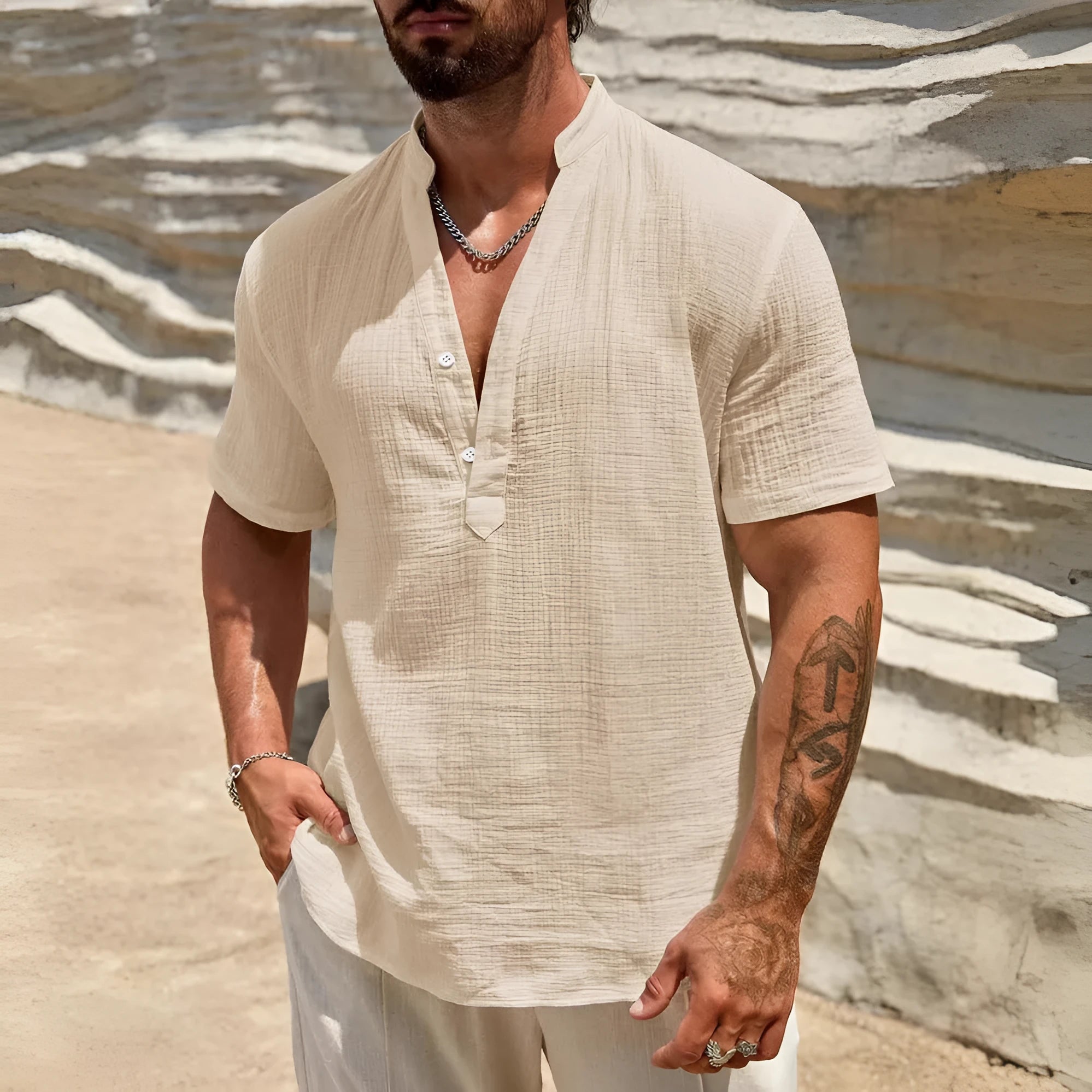 Man wearing a light blue stand collar short-sleeved casual shirt for summer.