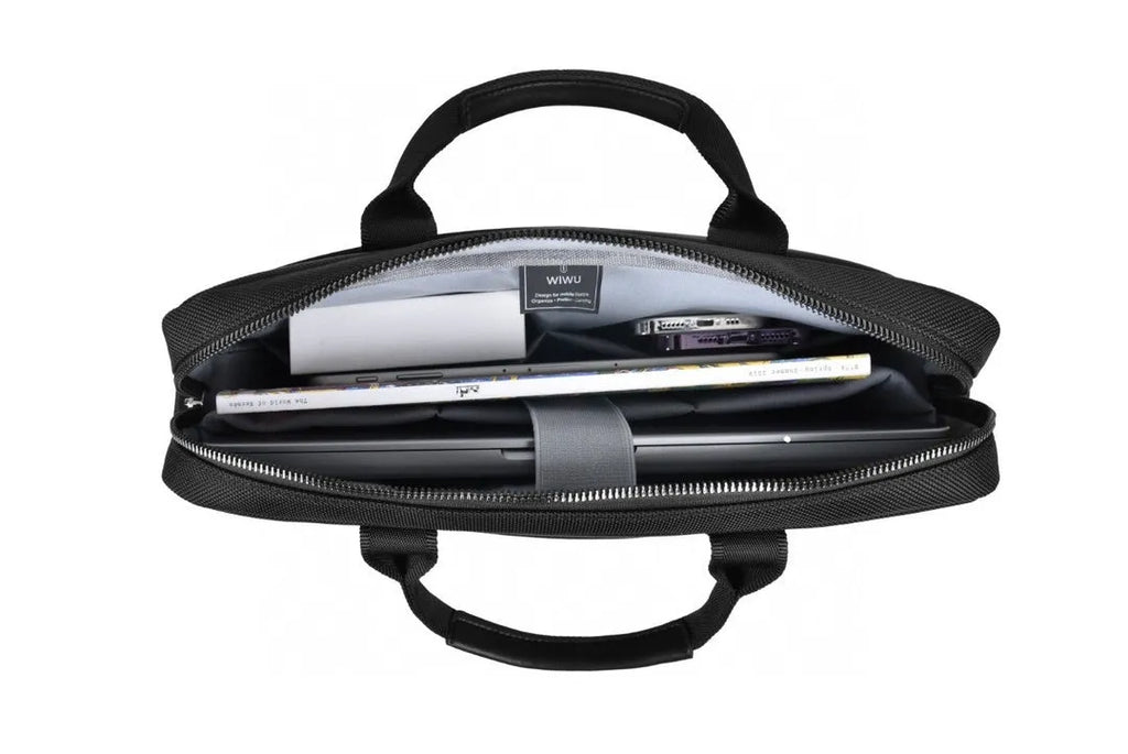 Black Oxford cloth multi-pocket laptop handbag open to show separate organiser layers and laptop compartment.