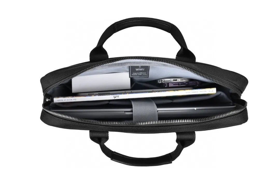 Black Oxford cloth multi-pocket laptop handbag open to show separate organiser layers and laptop compartment.