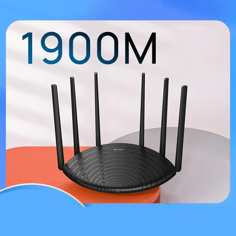 TP-Link TL-WDR7661 black AC1900 gigabit wireless router with fixed antennas on a desk.