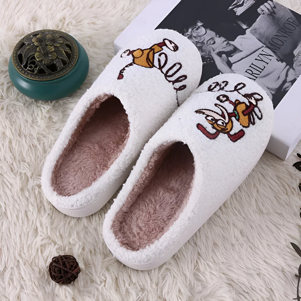 White fluffy slippers with cartoon patterns, rubber soles, and toe holder design