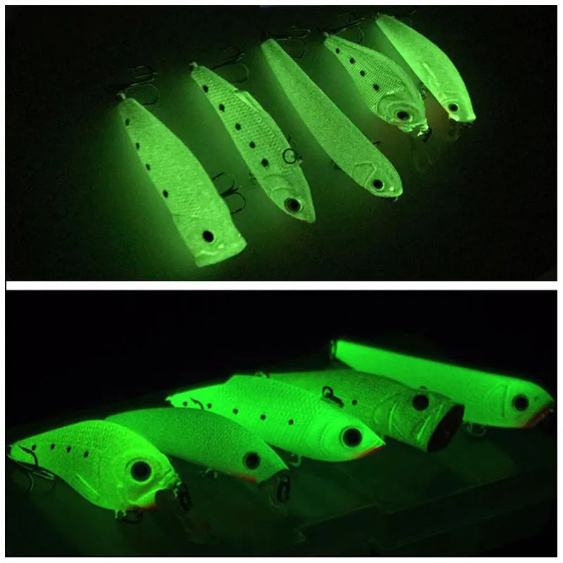 Set of five 3D fluorescent hard fishing lures with luminous details on a blue background.