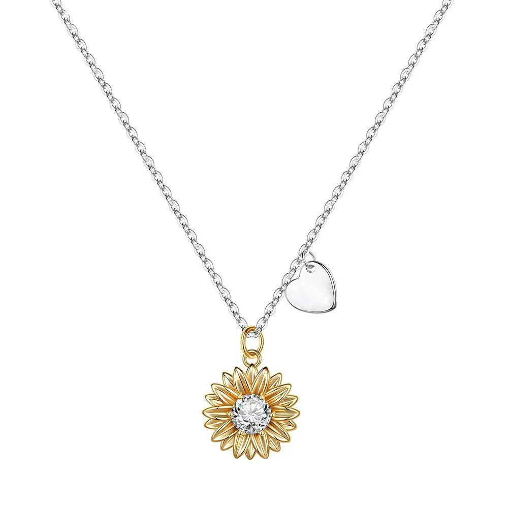 925 sterling silver sunflower pendant necklace on a cross chain, adjustable from 21cm to 50cm.