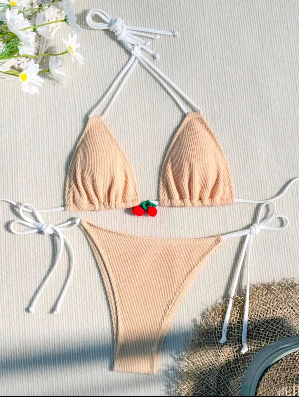 Women's bikini swimsuit set in a briefs style, shown in one of five solid colours: apricot, matcha, orange, pink, or white.