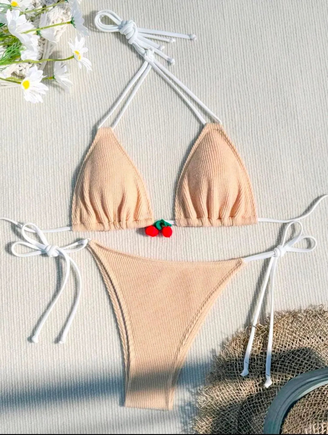 Women's bikini swimsuit set in a briefs style, shown in one of five solid colours: apricot, matcha, orange, pink, or white.