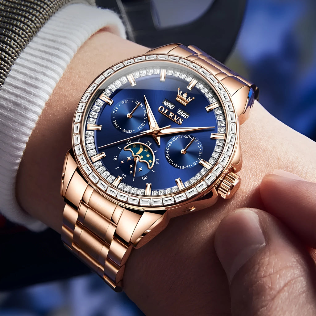 Men's automatic watch with diamond bezel and stainless steel bracelet on wrist, showing skeleton caseback.