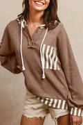 Straw yellow waffle texture hoodie with striped patchwork and a button neck.