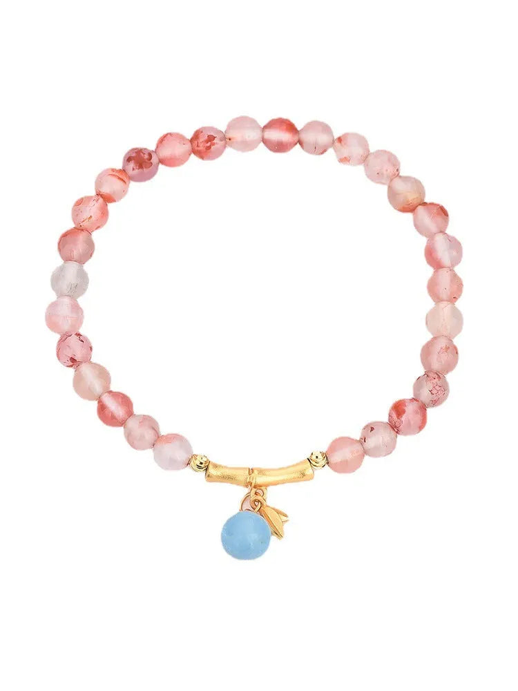 Ice float nanhong agate ethnic bracelet with flower shapes and bamboo joint decorative elements