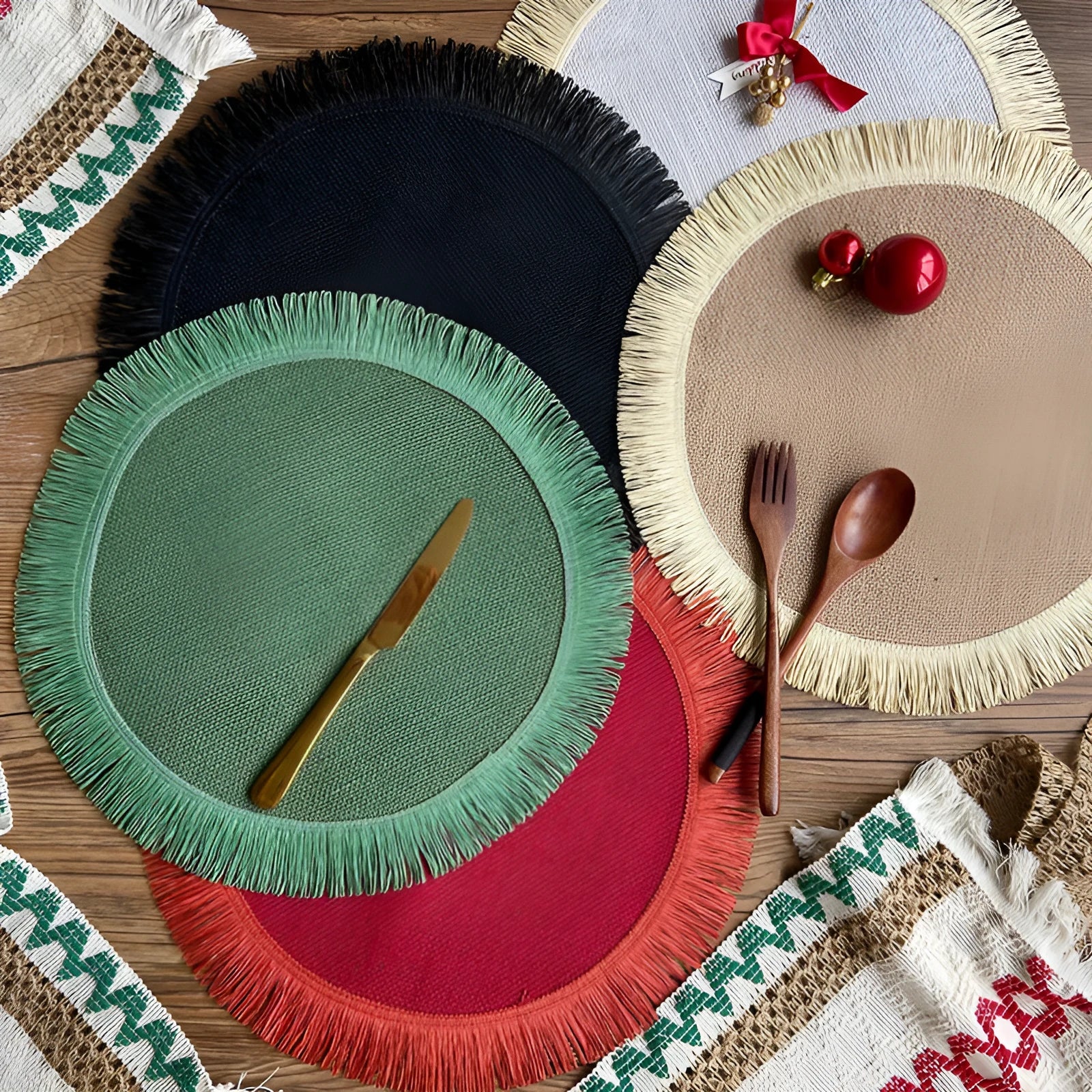 Handwoven round jute placemat with tassel edge in original hemp colour on a wooden table