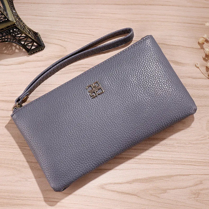 Long 55-inch black PU leather phone wallet handbag with a zipper, showing sewing line detail.