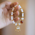 Women's Chinese style glass bracelet with Fu character and safety lock design in coloured glaze