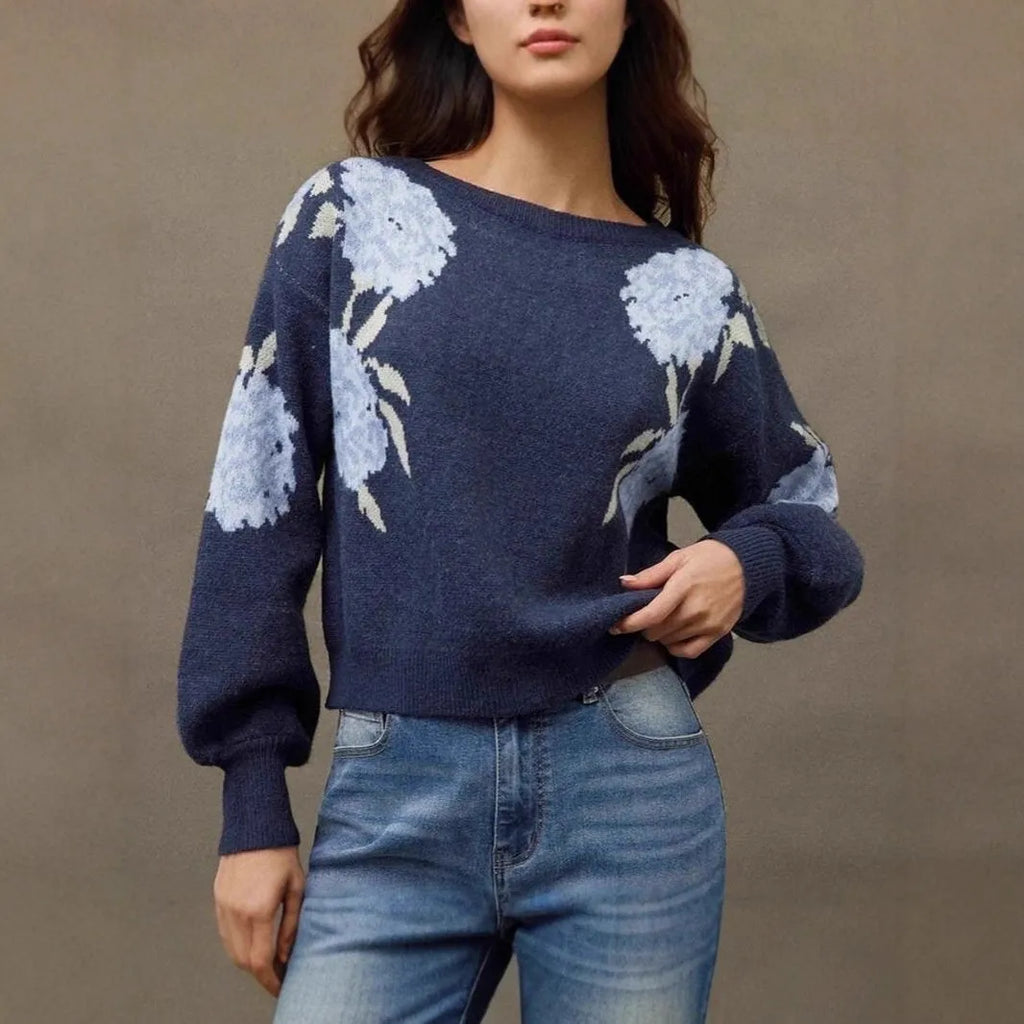 Sapphire blue women's loose pullover with floral jacquard pattern and off-neck design.