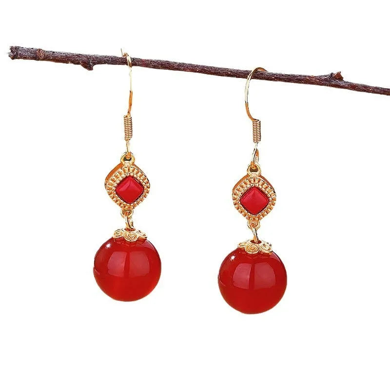 Geometric drop earrings with round Southern Red Agate beads and silver jasper inlay on an electroplated copper base.