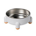 Green stainless steel pet food bowl with high foot and non-slip anti-overturn base.