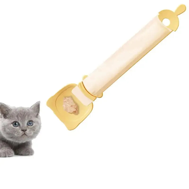 Cat Treat Spoon in green, orange, and white, measuring 27 x 6.5 cm, designed for scooping and serving cat strips