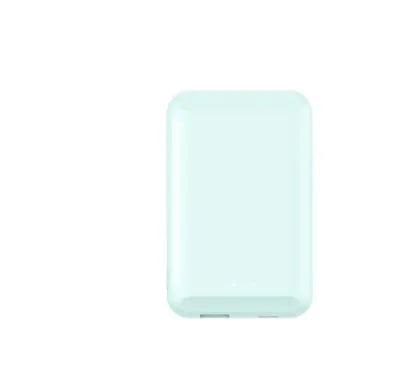 A black magnetic wireless power bank with a 5000mAh capacity, shown attached to a mobile phone.