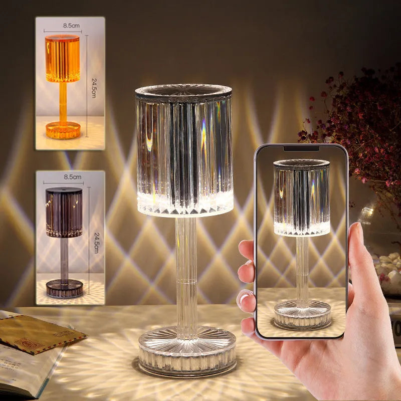 Modern crystal table lamp with a diamond-faceted shade on a metal stand, showing amber colour option.