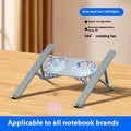 Silver aluminium laptop stand with twin cooling fans in folded position next to cloth storage bag