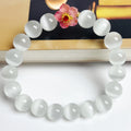 Handmade women's glass beaded bracelet with floral elements in yellow, pink, white, or green options