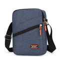 Oxford cloth commuter bag in silver grey, black, or navy blue with crossbody shoulder strap and contrast colour detailing