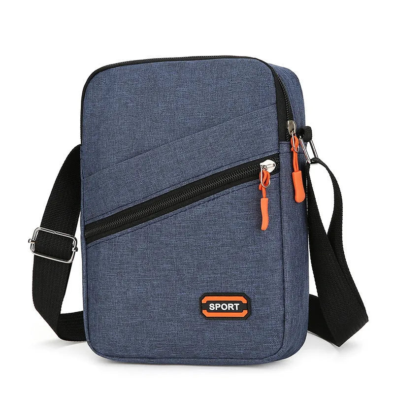 Oxford cloth commuter bag in silver grey, black, or navy blue with crossbody shoulder strap and contrast colour detailing
