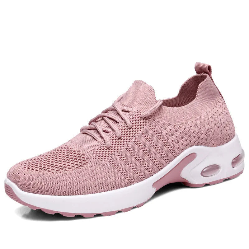 Women's black mesh casual sneakers with round toe and white lace-up front on a soft non-slip sole.