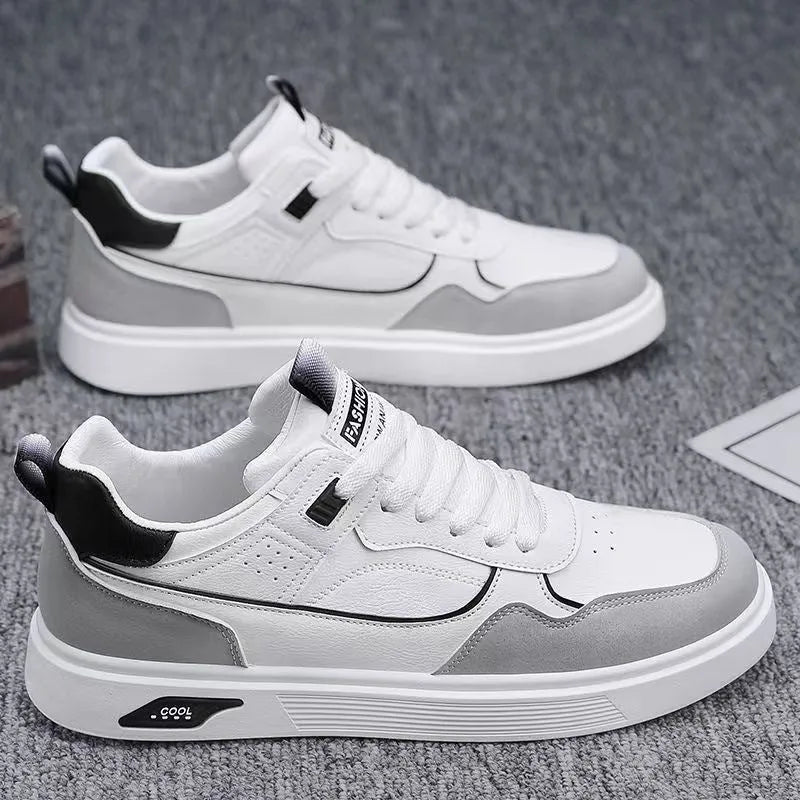 Men's Korean-style canvas board shoes in black with leather stitching details and mesh lining