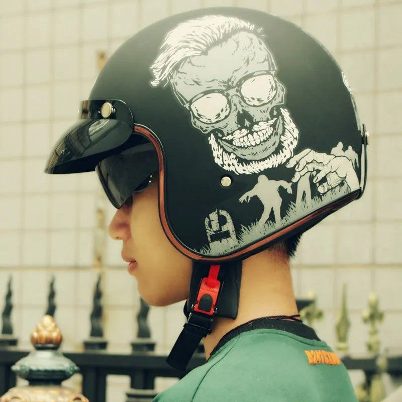 Retro-style half helmet for electric bicycles shown in a selection of colours including black, grey, white, and yellow.
