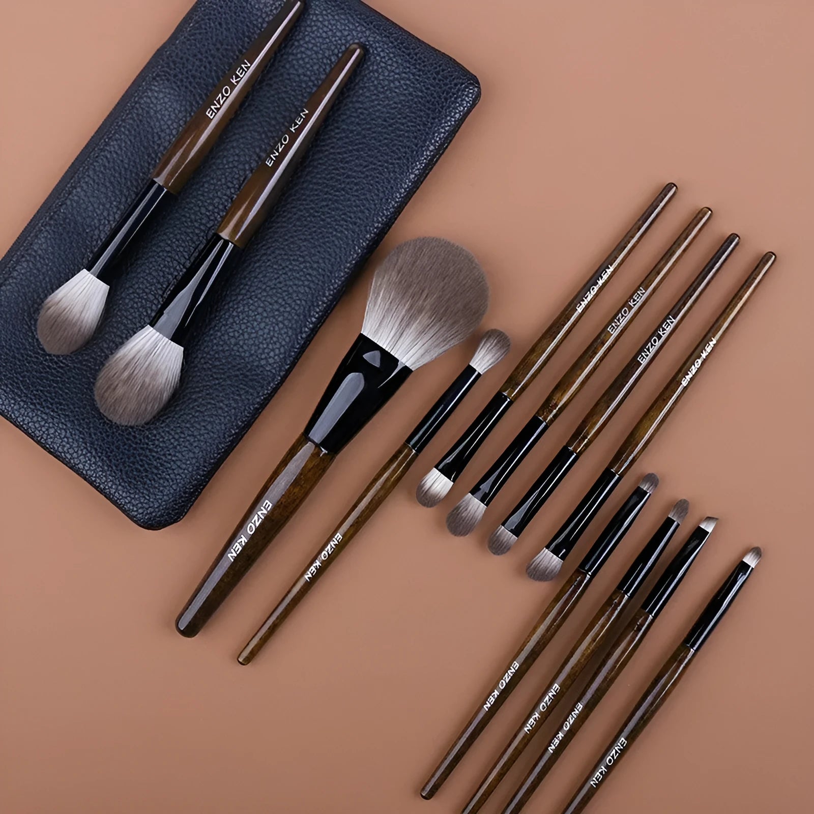 12-piece makeup brush set with wooden handles in a black PU travel case