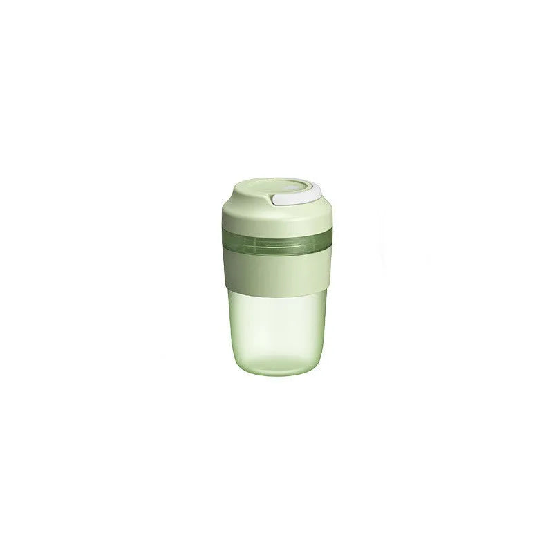 Portable 400ml blender juicer cup with four stainless steel blades in purple, green, or orange colours