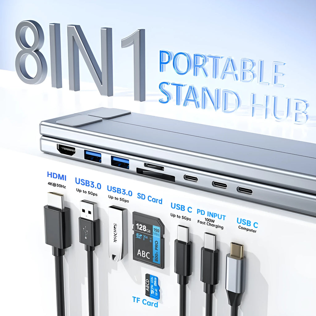 Aluminium folding laptop docking station stand with multi-port hub and HDMI output on a desk