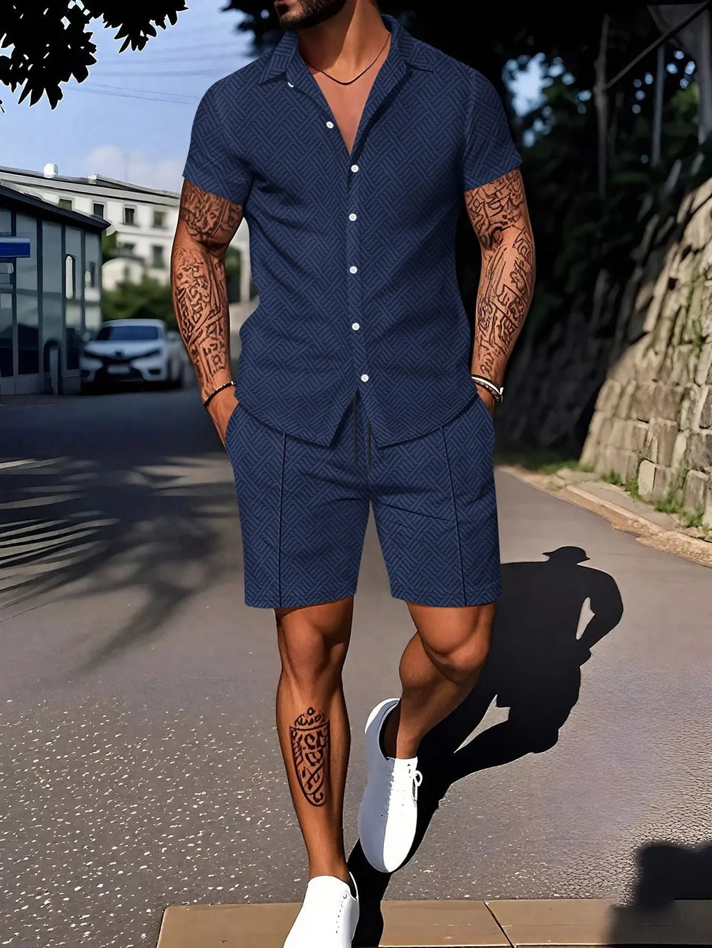 Man wearing a casual short sleeve digital print suit set consisting of a top and matching shorts.