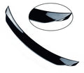 Bright black aftermarket tail trim spoiler for a Mazda 3 car rear bumper.