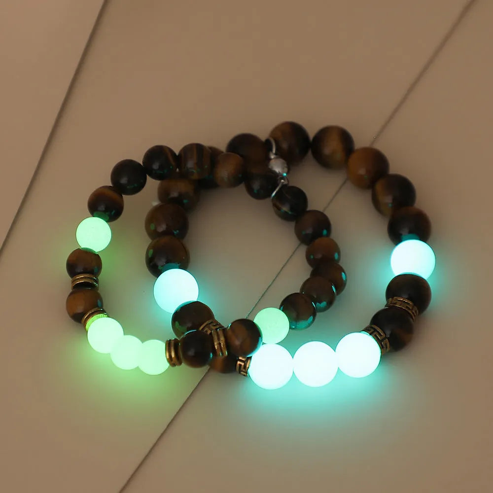 Geometric amber couple bracelets with luminous retro styling on display