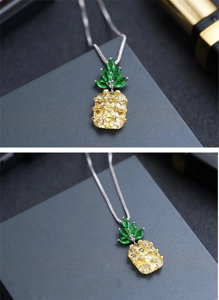 Silver geometric pineapple fruit pendant on a women's fashion necklace.