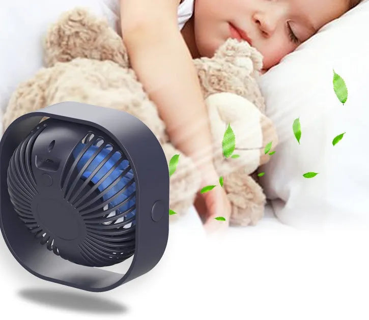 USB desk fan with alarm clock in blue colour, showing rotary switch and plastic blades.