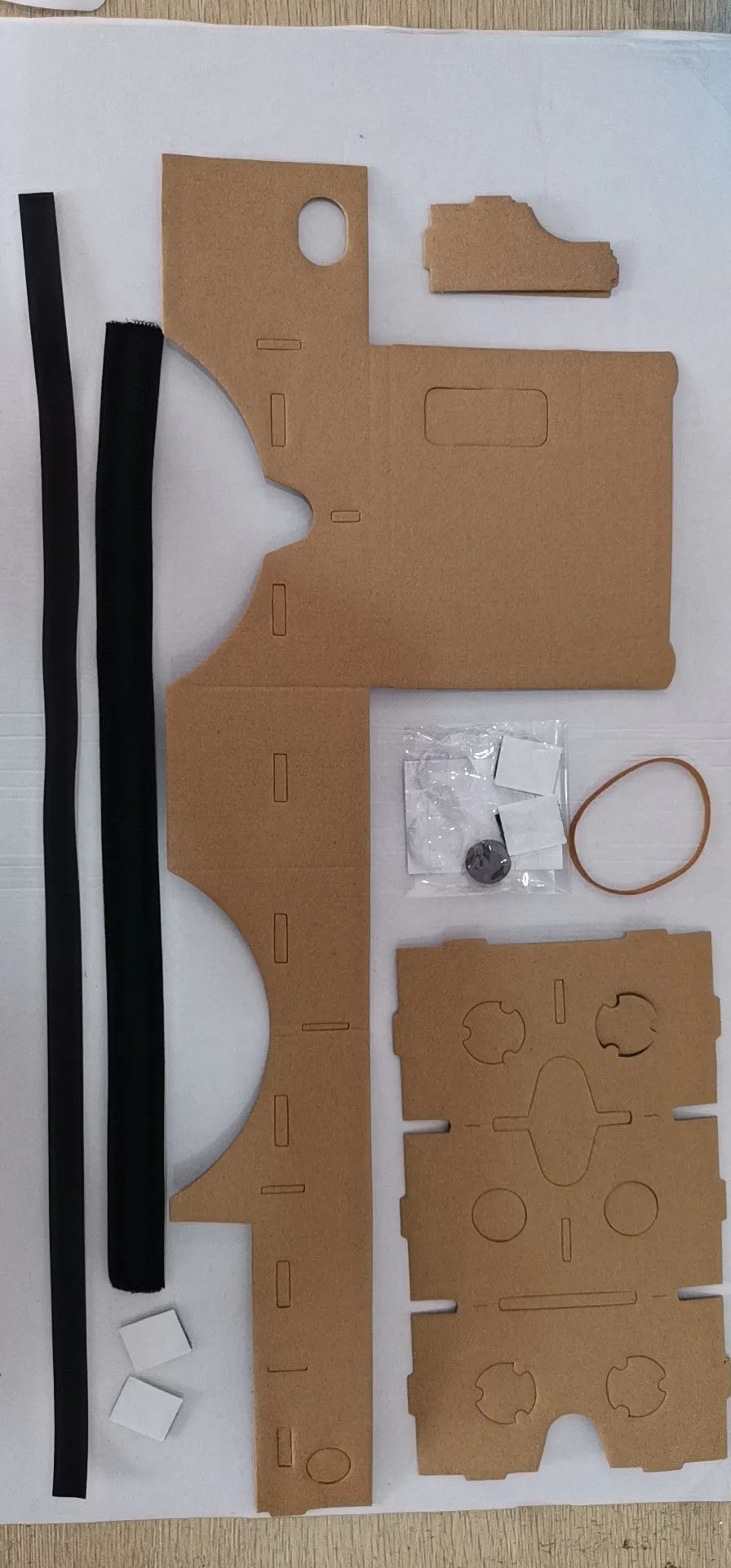 Pink and white VR cardboard glasses for smartphones with 3D lenses