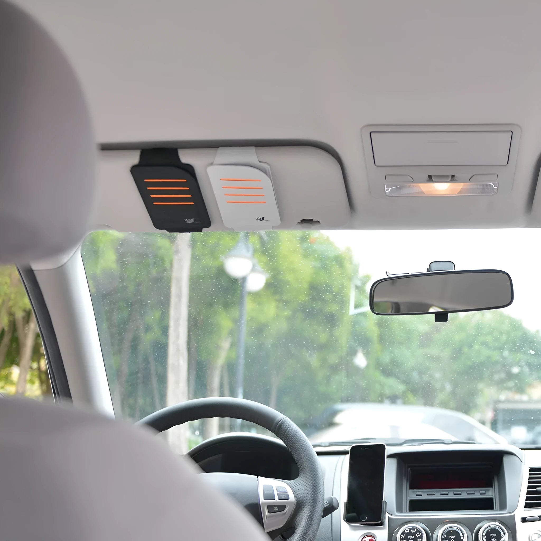 Car sun visor shading panel set of four tablets with a vehicle-mounted storage bag in grey or black.