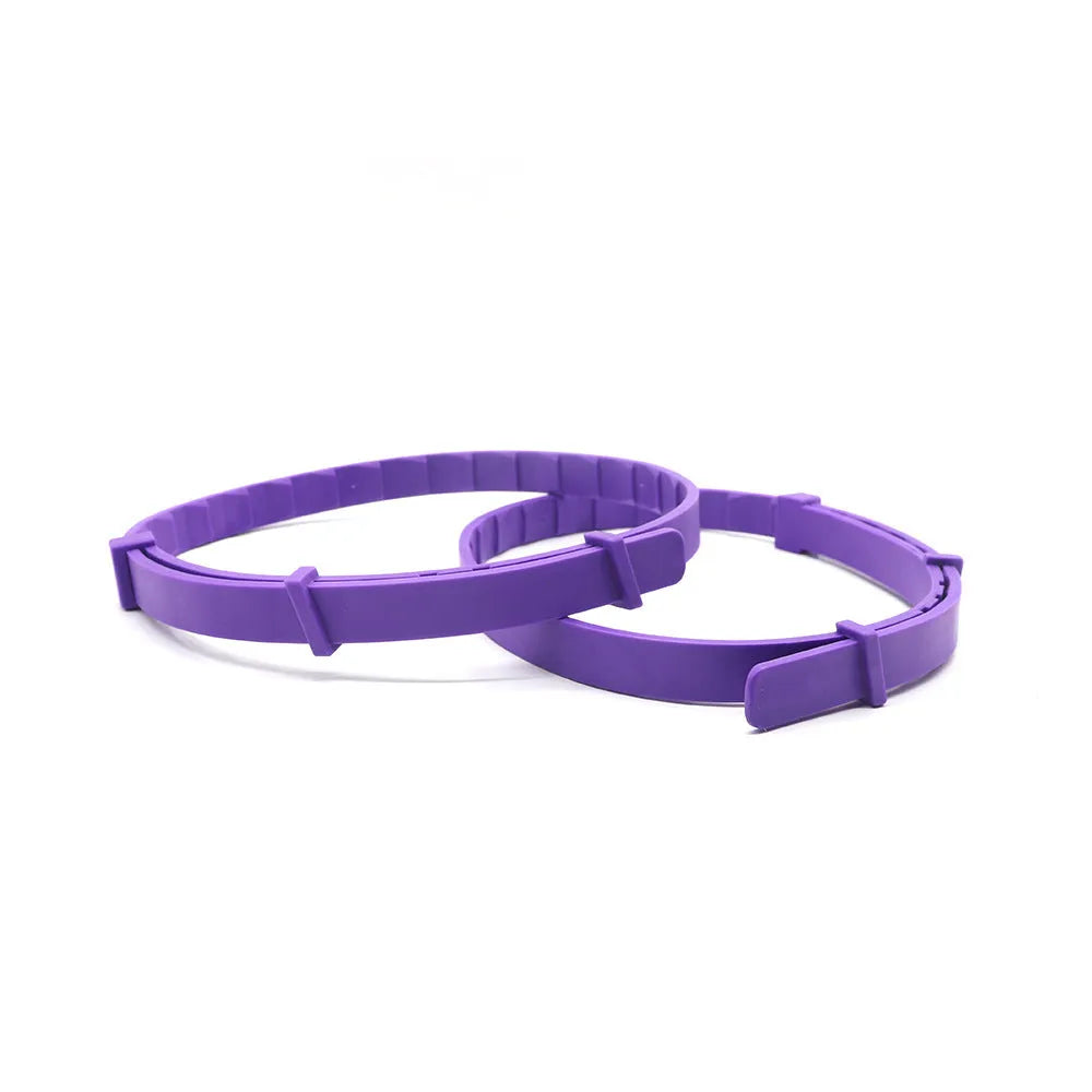 Set of four monochrome TPR dog calming collars in six colour options, each measuring 62 cm.