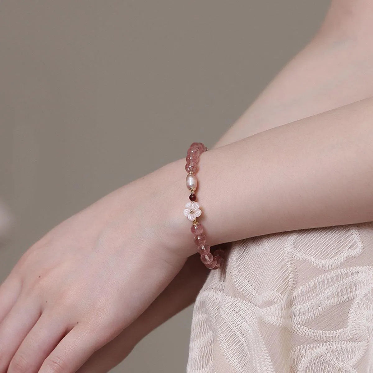 Strawberry quartz peach blossom crystal bracelet with flower-shaped beads for casual jewellery wear