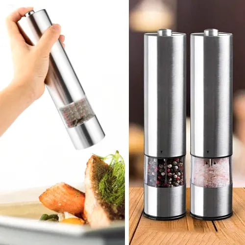 Tall stainless steel electric pepper grinder on a kitchen countertop.