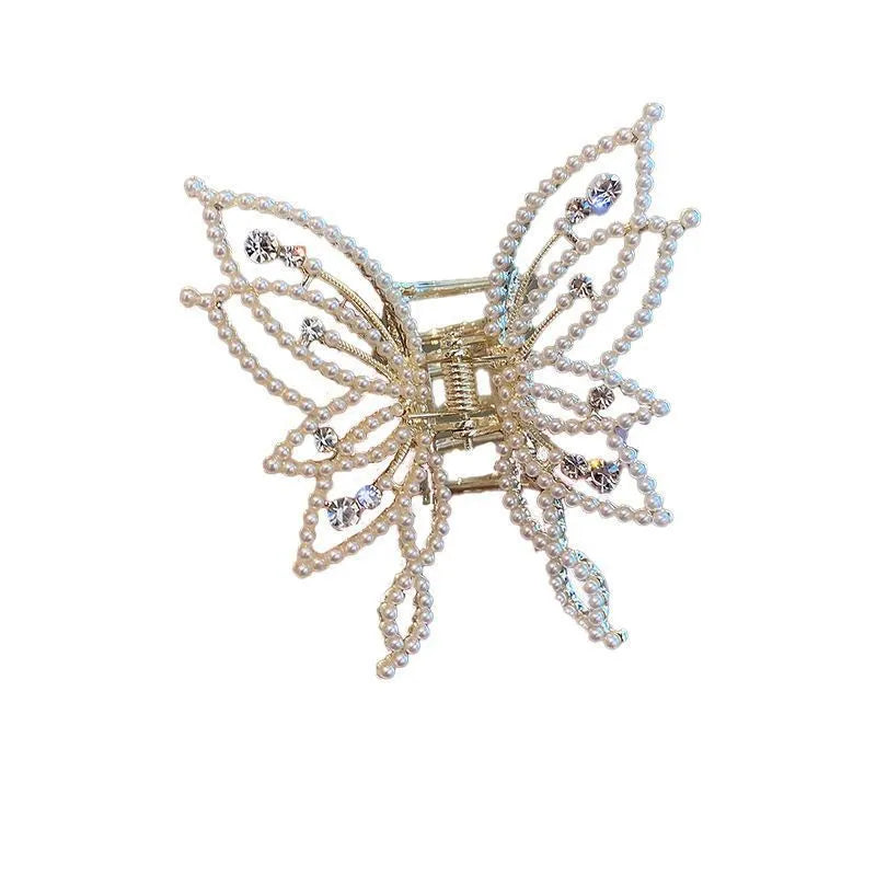 Butterfly design alloy hair barrette with electroplated finish measuring 6.7x6.2cm