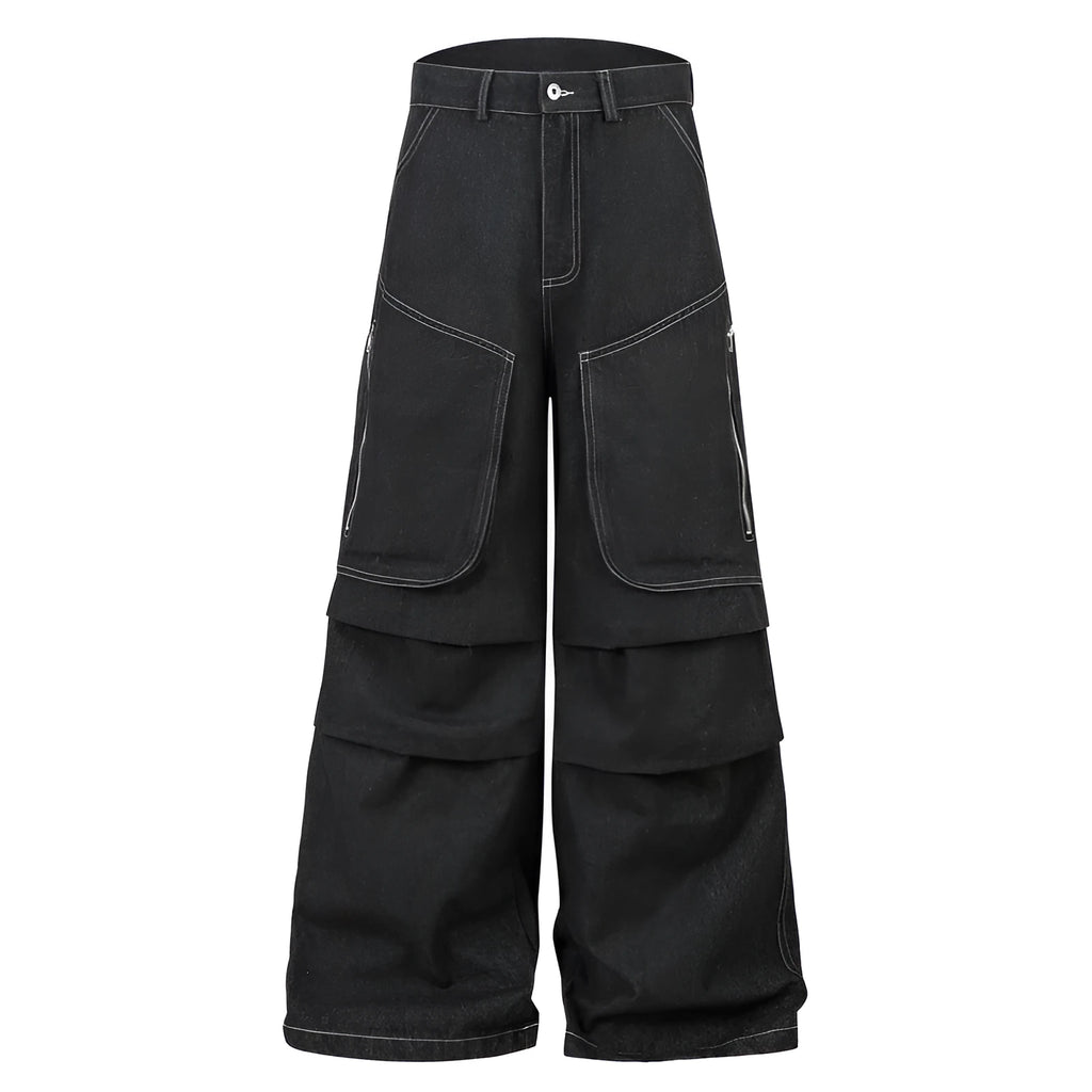 Black pleated work trousers with multiple pockets, mid waist cut, and zip fly in cotton denim fabric