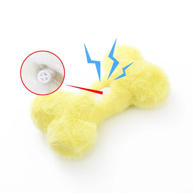 Cute plush love bone dog toy with a squeaker in blue, pink, and yellow colours.